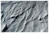Layered Terrain in Aeolis and Zephyria Regions
