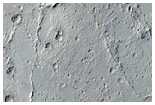 Zunil Crater Ray Formed within a Dusty Region