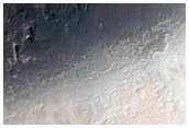 Light and Dark Layers Exposed in Crater Wall
