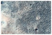 Mounds with Flows in Acidalia Planitia