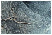 Central Structure and Layering of a Large Impact Crater