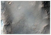 Impact Craters of Similar Diameter Separated by Ridge
