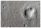 Mounds with Summit Pits