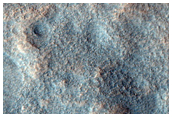 Possible Phyllosilicates in Ejecta From Stokes Crater