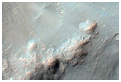 Crater in Tyrrhena Terra with Phyllosilicates and Sulfates