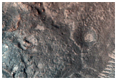 Central Peak and Ring with Megabreccia in 13-Kilometer Diameter Crater