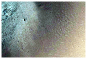 Small Crater Exposed in Cross-Section by Erosion