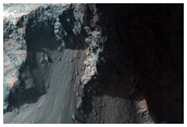 Light-Toned Material in the Wall of Juventae Chasma