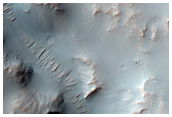 Valley Breaching Oblique Crater Rim