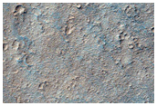Small Shield Volcano on Arsia Mons Caldera Rim