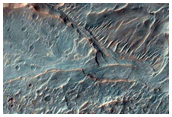 Exhumed Light-Toned Deposit along Coprates Catena Floor