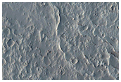 Flank and Summit of Low Shield Volcano East of Jovis Tholus