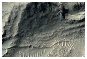 Crosscutting Ridges Beyond Margins of Mantle Material