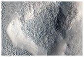 Cracks and Pits along Crater Wall in Protonilus Mensae