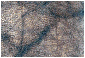 Crater with Light-Toned Material around Rim
