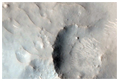 Lobate Feature and Fan near Crater Wall