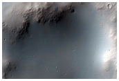 Fluvial Features at Intersection of Two Craters