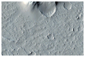 Arc of Cones with Summit Pits in CTX Image