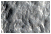 Ejecta of Well-Preserved 12-Kilometer Diameter Crater