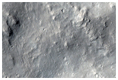 Small Very Fresh Crater on Ejecta of Large Well-Preserved Crater