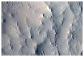 Well-Preserved 22-Kilometer Diameter Crater off Ascraeus Mons