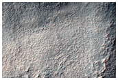 Hollows on Floor of Crater in Terra Sirenum