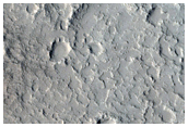 Trough and Flows on East Side of Elysium Region Rise