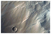 Central Peak and Rim of 10-Kilometer Diameter Crater with Layered Ejecta