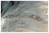 Fresh 7-Kilometer Diameter Crater within Herschel Crater