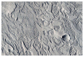 Crescent-Shaped Forms in Crater Fill Material