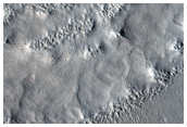 Lines of Pits in Crater in Protonilus Mensae