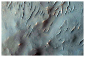 Very Well-Preserved 15-Kilometer Diameter Crater in Thaumasia Planum