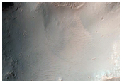 Central Pit and Chaos of a Large Impact Crater