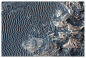 Light-Toned Material on Floor of Tithonium Chasma