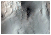 Possible Hydrate-Rich Terrain in Ius Chasma