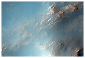 Possible Phyllosilicate-Rich Terrain in Ejecta of Crater on Huygens Crater
