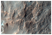 Possible Layered Alunite-Kaolinite-Rich Terrain in Cross Crater