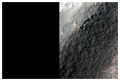 Massif and Apron Features in Promethei Terra