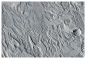 Crescent-Shaped Forms in Crater Fill Material