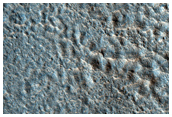 Heavily Pitted Streamlined Ejecta Lobe Originating from Mojave Crater