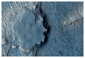 Topografa invertida cerca de Juventae Chasma