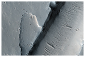 Channels and Lava Flows on the Tharsis Plateau
