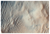 Possible Remnant of Pitted Materials in Bakhuysen Crater