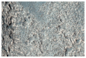 Pits Exposing Layered Bedrock
