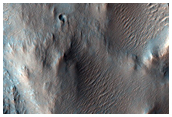 Possible Olivine-Rich Terrain North of Hellas Planitia