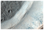 Small Crater with Gullies and a Bright Fan