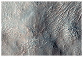 Olivine-Rich Knob Associated with Crater in Argyre Planitia