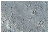 Candidate New Impact Site Formed between November 2004 and February 2010
