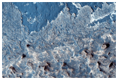 Dark-Toned Unit Exposed atop Crater Ejecta in Meridiani Planum
