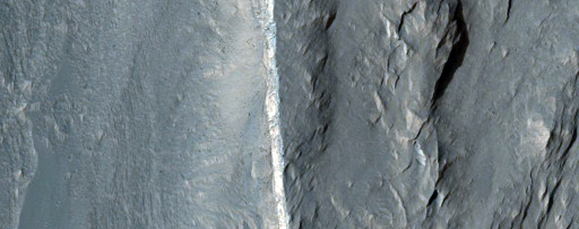 Wallrock and Light-Toned Layering Geologic Contact in Coprates Chasma